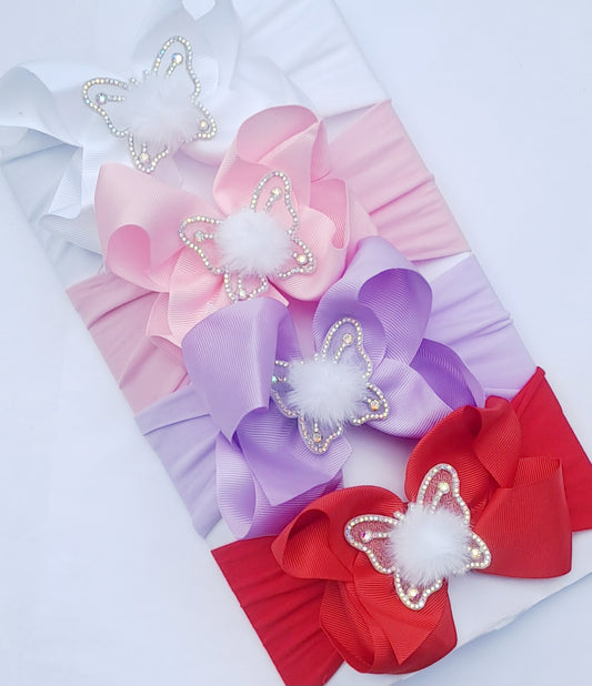 🎀Boutique Bow Headband With Pom Pom Butterfly Centre🎀